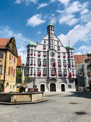 Memmingen City Hall. The town hall in Memmingen in Upper Swabia is a multi-storey Renaissance building from the 16th century. It sets a strong urban accent and closes the market place to the northeast. It is one of Memmingen's most famous buildings.