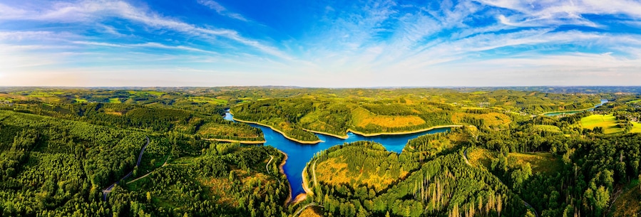 the bergisches land landscape with a dam in germany from above panorama