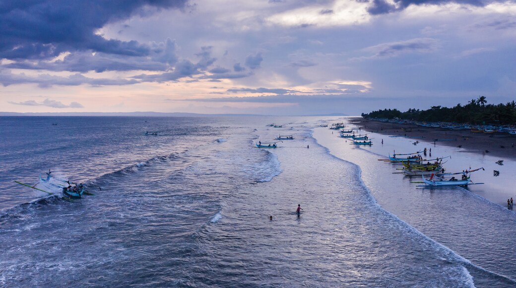 Beach of Perancak with fishing boats in West Bali Indonesia