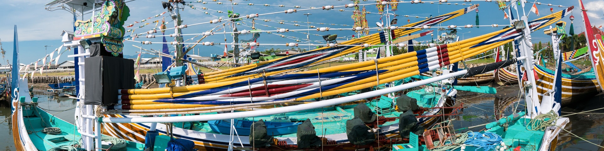 Old traditional wooden Indonesia colored boats in Bali Island, I