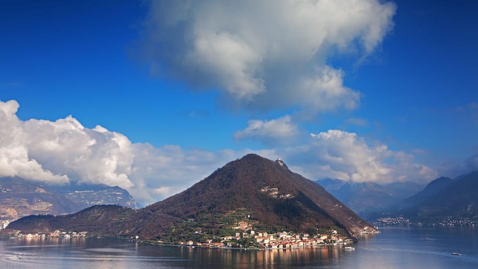 Mount Island in the middle of Iseo Lake during spring, in the North of Italy