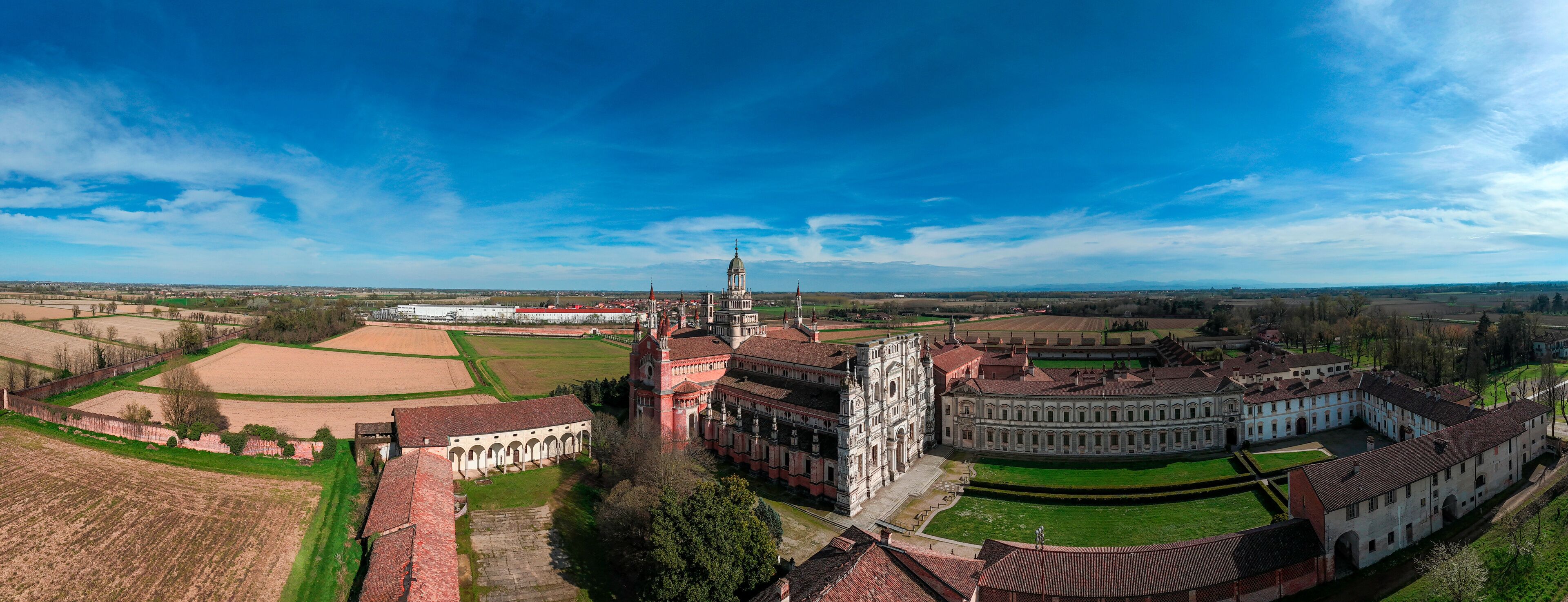 Aerial view of the Certosa di Pavia, built in the late fourteenth century, courts and the cloister of the monastery and shrine in the province of Pavia, Lombardia, Italy