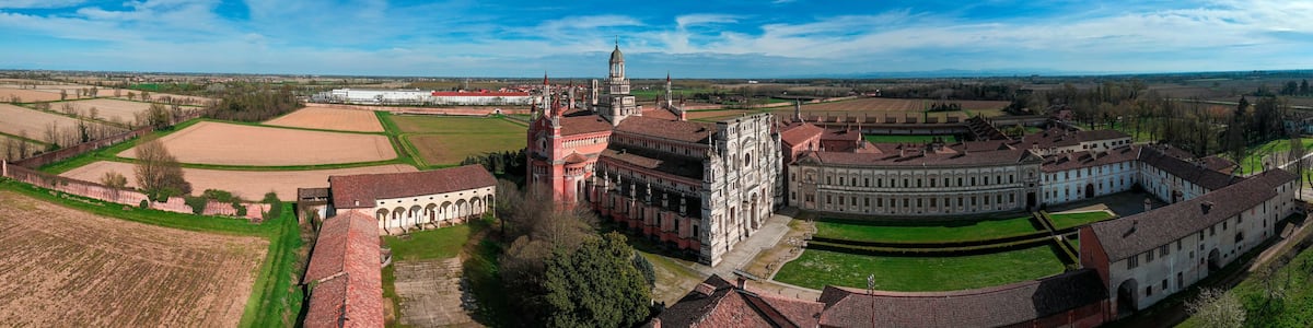Aerial view of the Certosa di Pavia, built in the late fourteenth century, courts and the cloister of the monastery and shrine in the province of Pavia, Lombardia, Italy