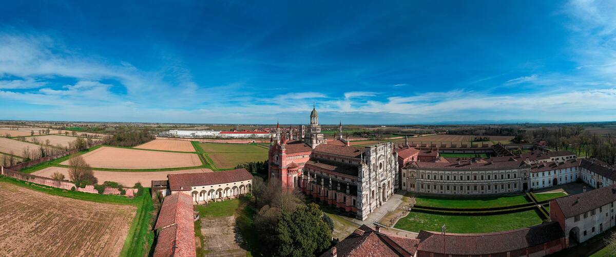 Aerial view of the Certosa di Pavia, built in the late fourteenth century, courts and the cloister of the monastery and shrine in the province of Pavia, Lombardia, Italy
