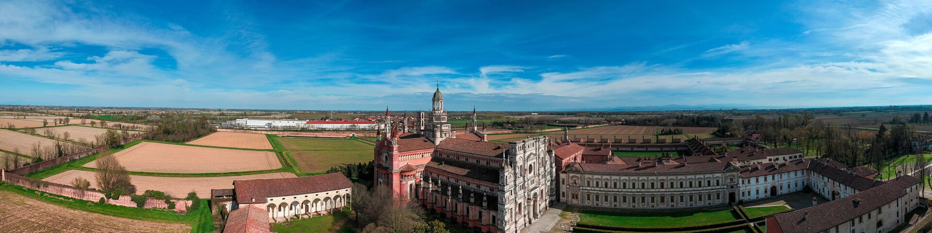 Aerial view of the Certosa di Pavia, built in the late fourteenth century, courts and the cloister of the monastery and shrine in the province of Pavia, Lombardia, Italy