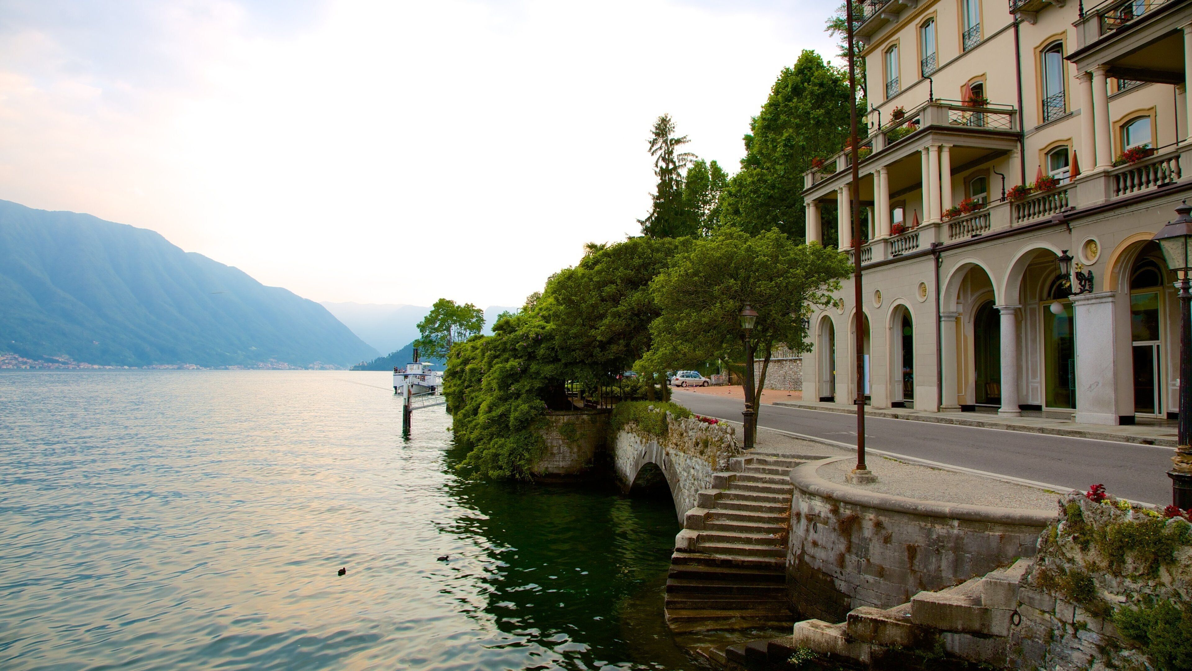 Tremezzo which includes a bay or harbor, a coastal town and general coastal views