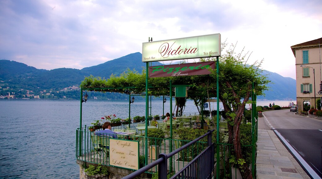 Tremezzo which includes a coastal town and signage