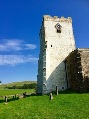 Pretty village with whitewashed church tower