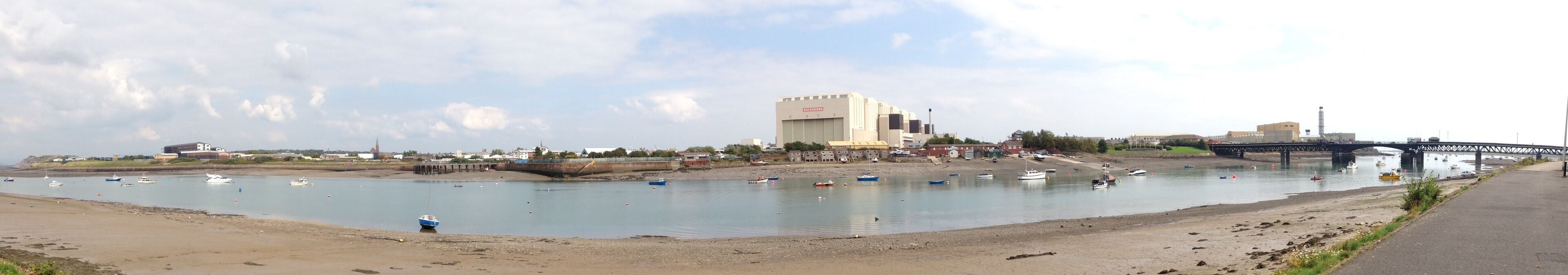 Panorama of Barrow-in-Furness in September 2014 from Walney Island showing Furness College, St. James' Church, BAE Systems and Walney Bridge