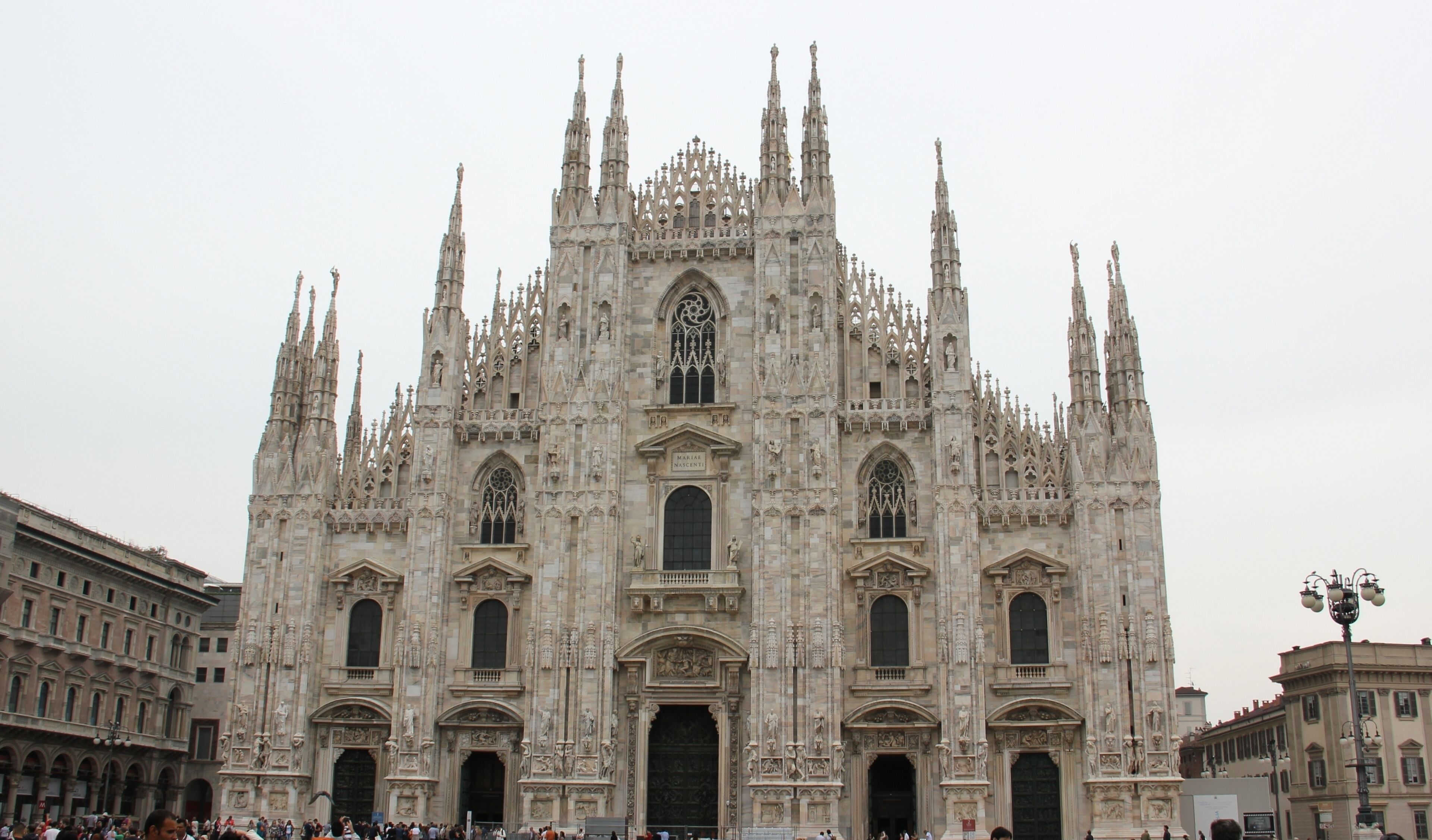 A grand cathedral with intricate Gothic architecture, featuring multiple spires and statues.