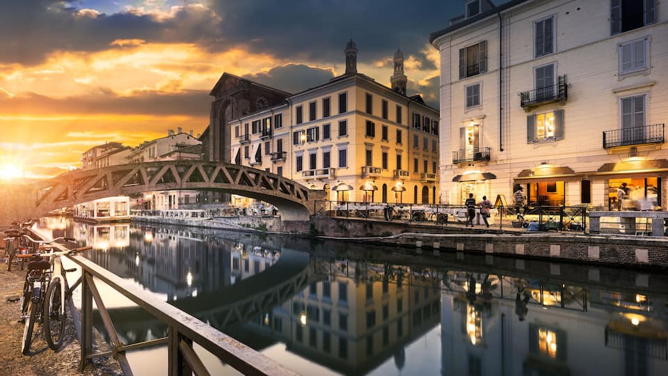Bridge across the Naviglio Grande canal at the evening in Milan, Italy; Shutterstock ID 316886099