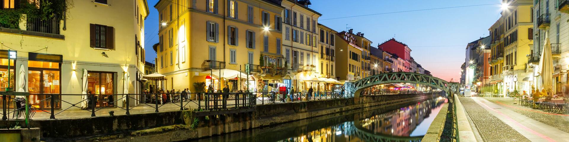 Milan Navigli Milano restaurant and bar district travel traveling holidays vacation town blue hour panorama in Italy