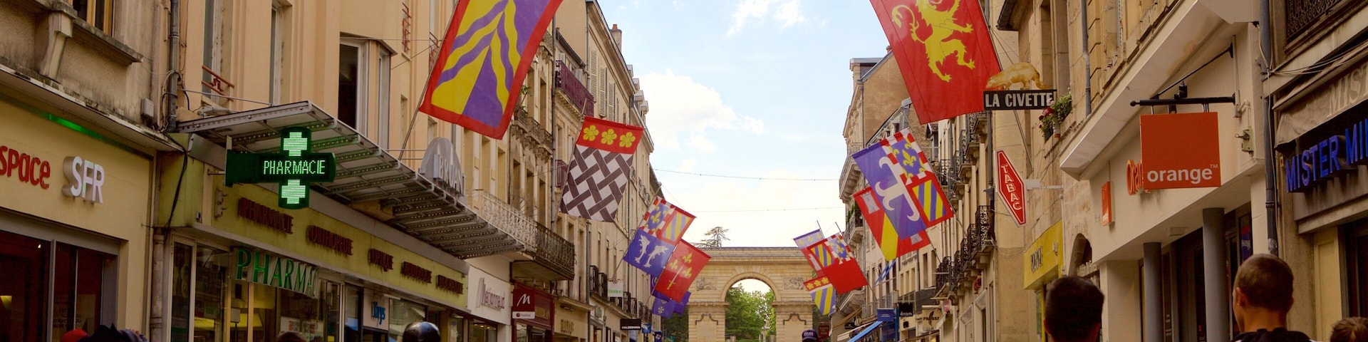 Burgundy featuring street scenes and shopping as well as a small group of people