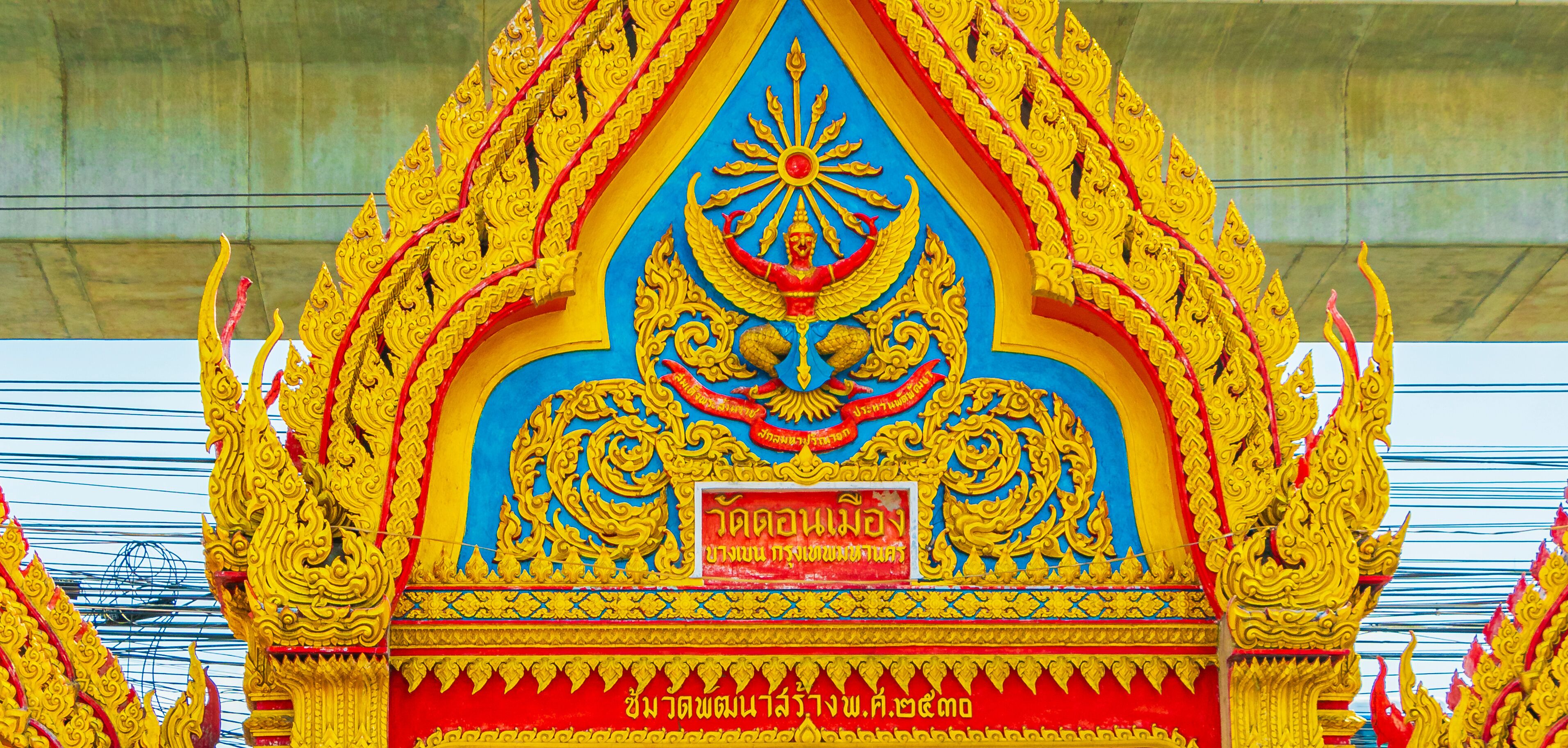Colorful Wat Don Mueang Phra Arramluang buddhist temple Bangkok Thailand.