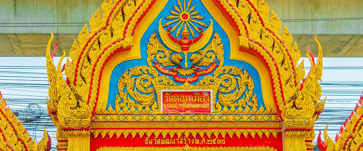 Colorful Wat Don Mueang Phra Arramluang buddhist temple Bangkok Thailand.