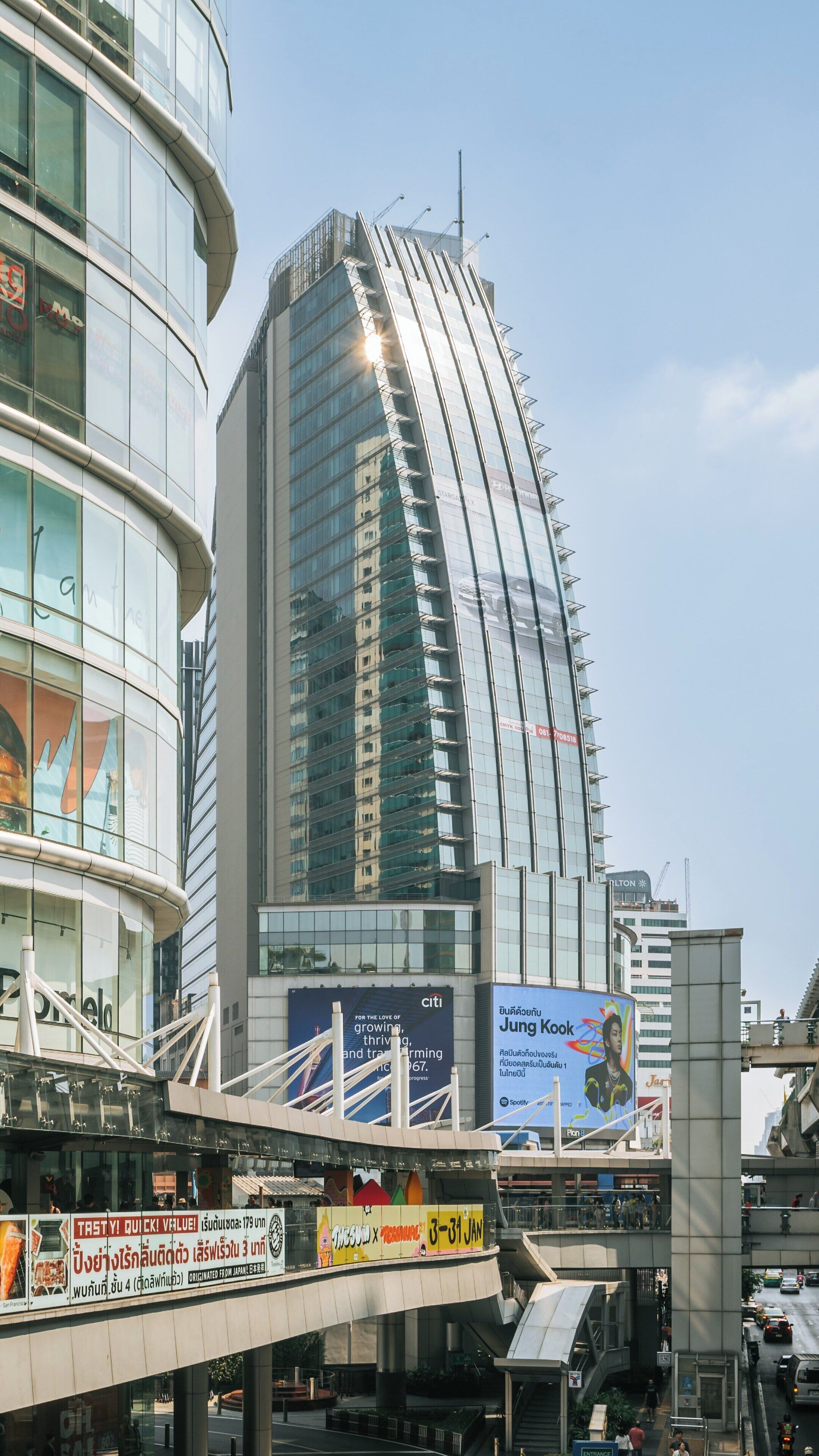 Exploring Terminal 21 Shopping Mall in Sukhumvit, Bangkok, Thailand with vibrant urban architecture and busy atmosphere