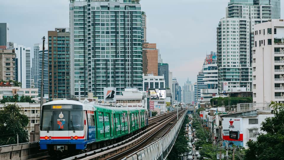 Sukhumvit featuring railway items and a city