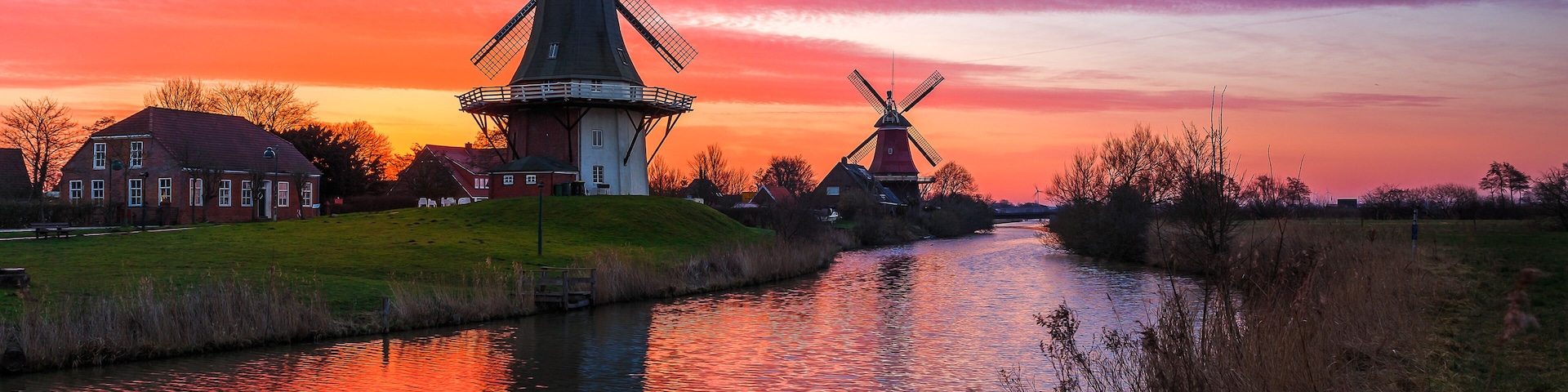 The famous twin mills of Greetsiel, East Frisia at sunrise; Shutterstock ID 605847044; purchase_order: SP-1332 HA Batch 2 August 2018; Order: ; client: HomeAway; other: To be paid with HA budget