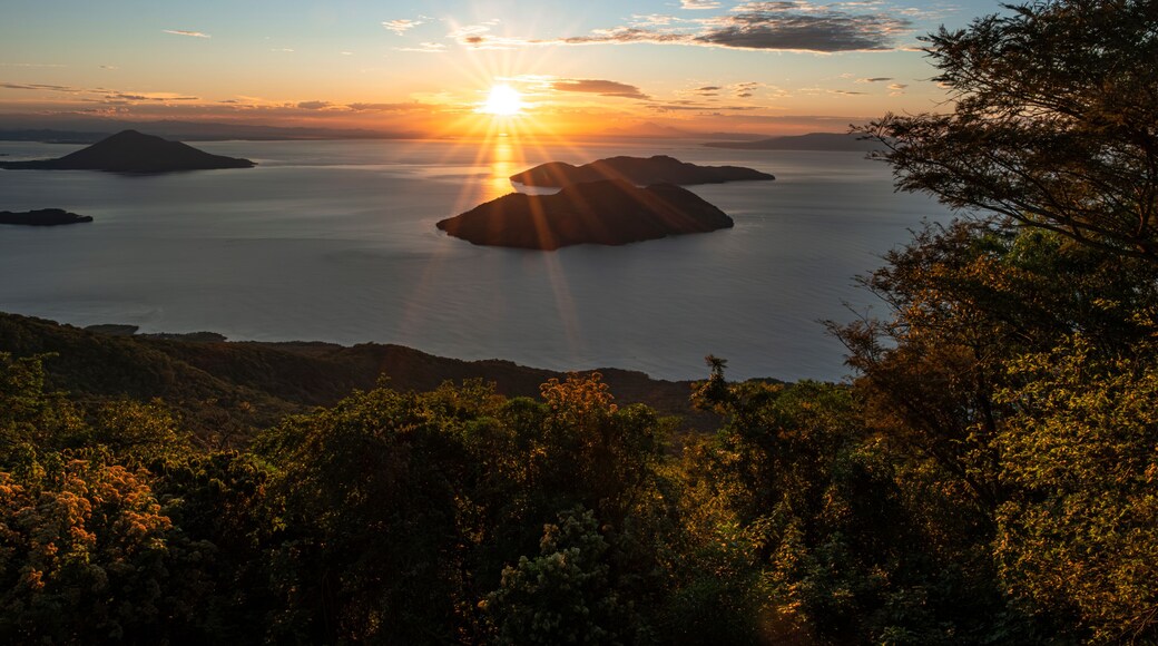 View of Fonesca Gulf and La Union Bay from the top of Conchagua Volcano observation platform at sunrise hour in El Salvador. The place were borders of Honduras, Nicaragua and El Salvador meet.