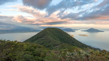 View of Fonesca Gulf and La Union Bay from the top of Conchagua Volcano observation platform at sunset hour in El Salvador. The place were borders of Honduras, Nicaragua and El Salvador meet.
