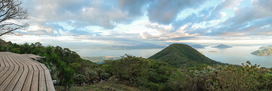 Wide angle panorama of Fonesca Gulf and La Union Bay from the top of Conchagua Volcano observation platform in El Salvador. The place were borders of Honduras, Nicaragua and El Salvador meet.