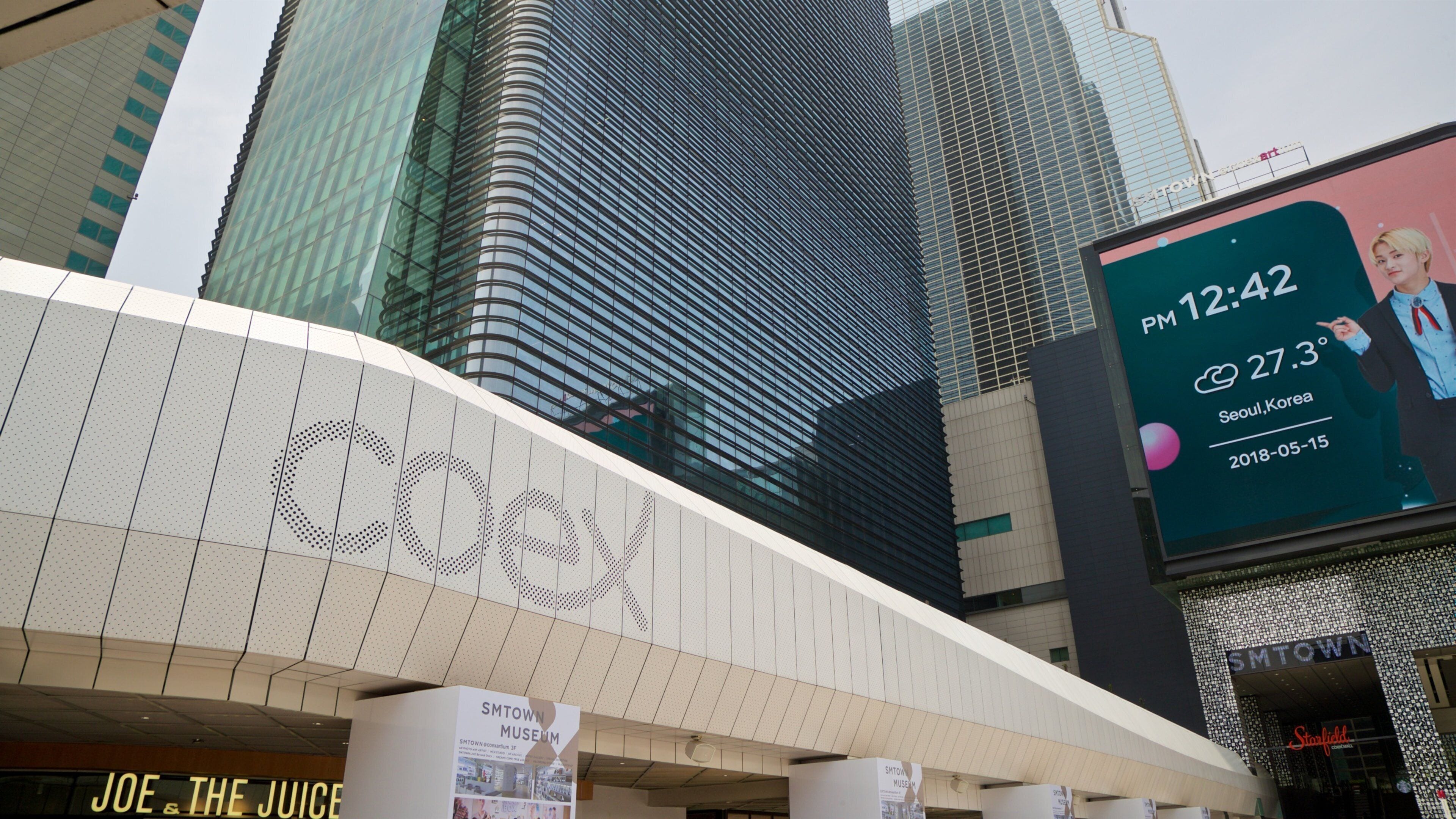 Gangnam showing a city and signage