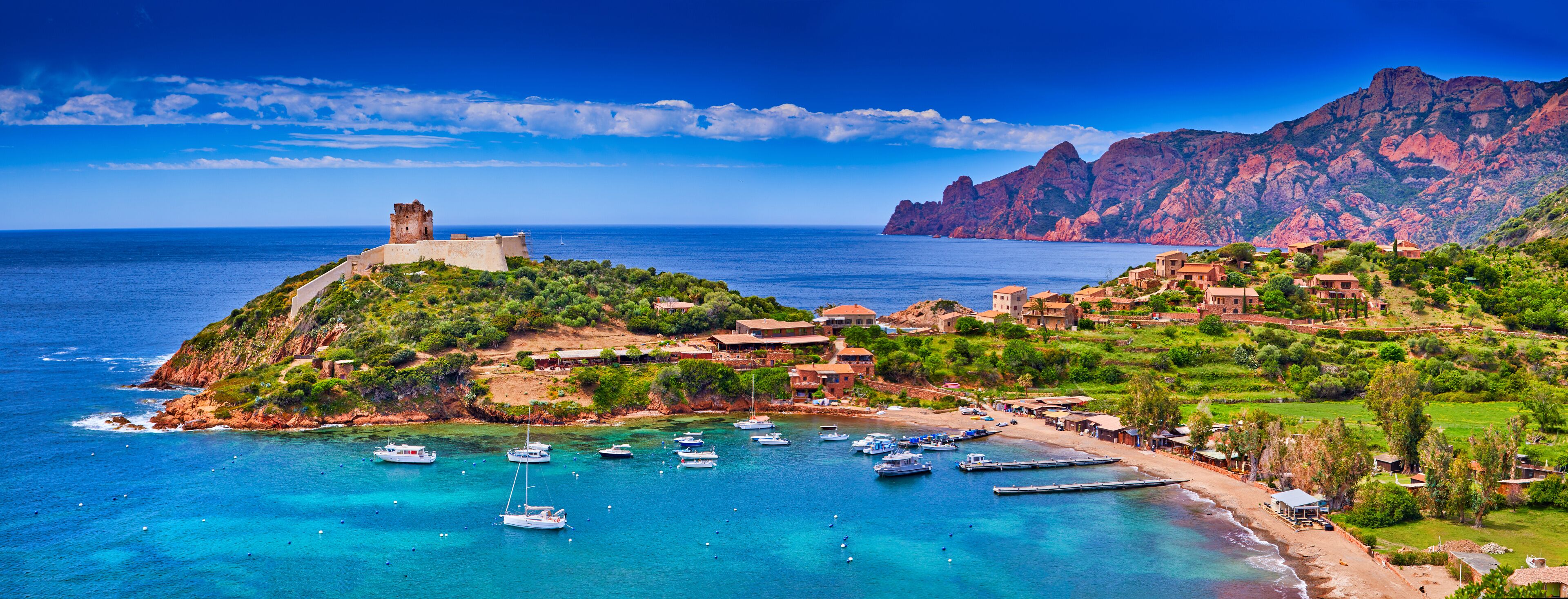 Panorama of Girolata Bay in Corsica Island, Corse-du-Sud, France. Scandola Nature Reserve a Natural World Heritage Site, Regional Park. It cannot be reached by car, only by walking or boats. Postcard.