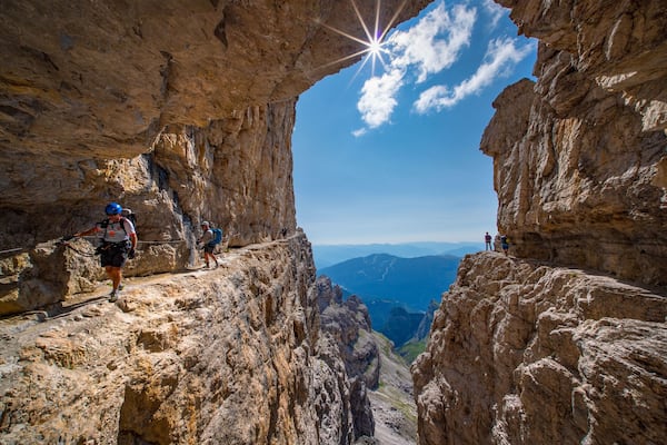 The spectacular Via Ferrata Bocchette in the Brenta group of the Dolomites in Italy. This is one of the most iconic sections of trail with breathtaking exposure and views. #Adventure #dolomites #italy #viaferrata #italianalps