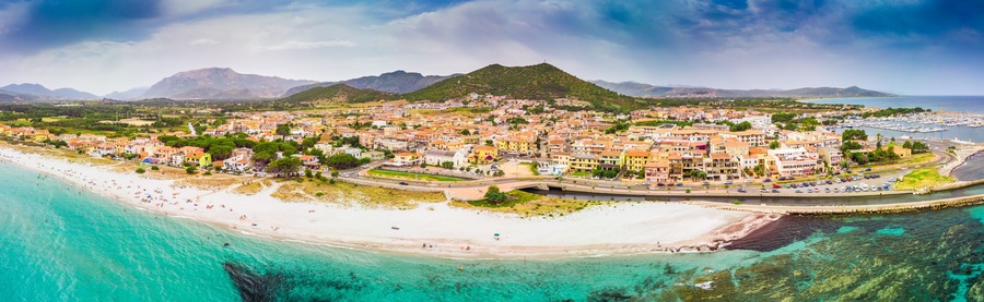 Graniro beach and La Caletta town, Sardinia, Italy, Europe.