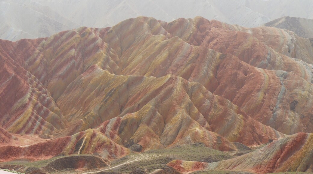 Zhangye National Geopark, the "Rainbow" or "Colorful" Mountains. About 30 minutes west of the city of Zhangye in the Gansu province of China. Buses from two park tourist centers ferry you to 4-6 stops within the park where you can climb up to various viewing platforms and walkways.
#Red