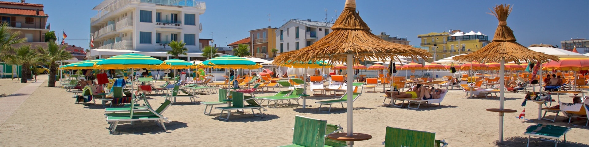 Torre Pedrera featuring a sandy beach, general coastal views and a coastal town
