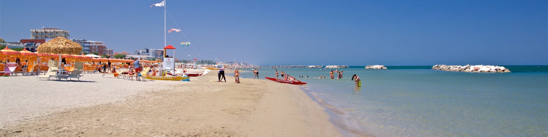 Torre Pedrera which includes swimming, general coastal views and a beach