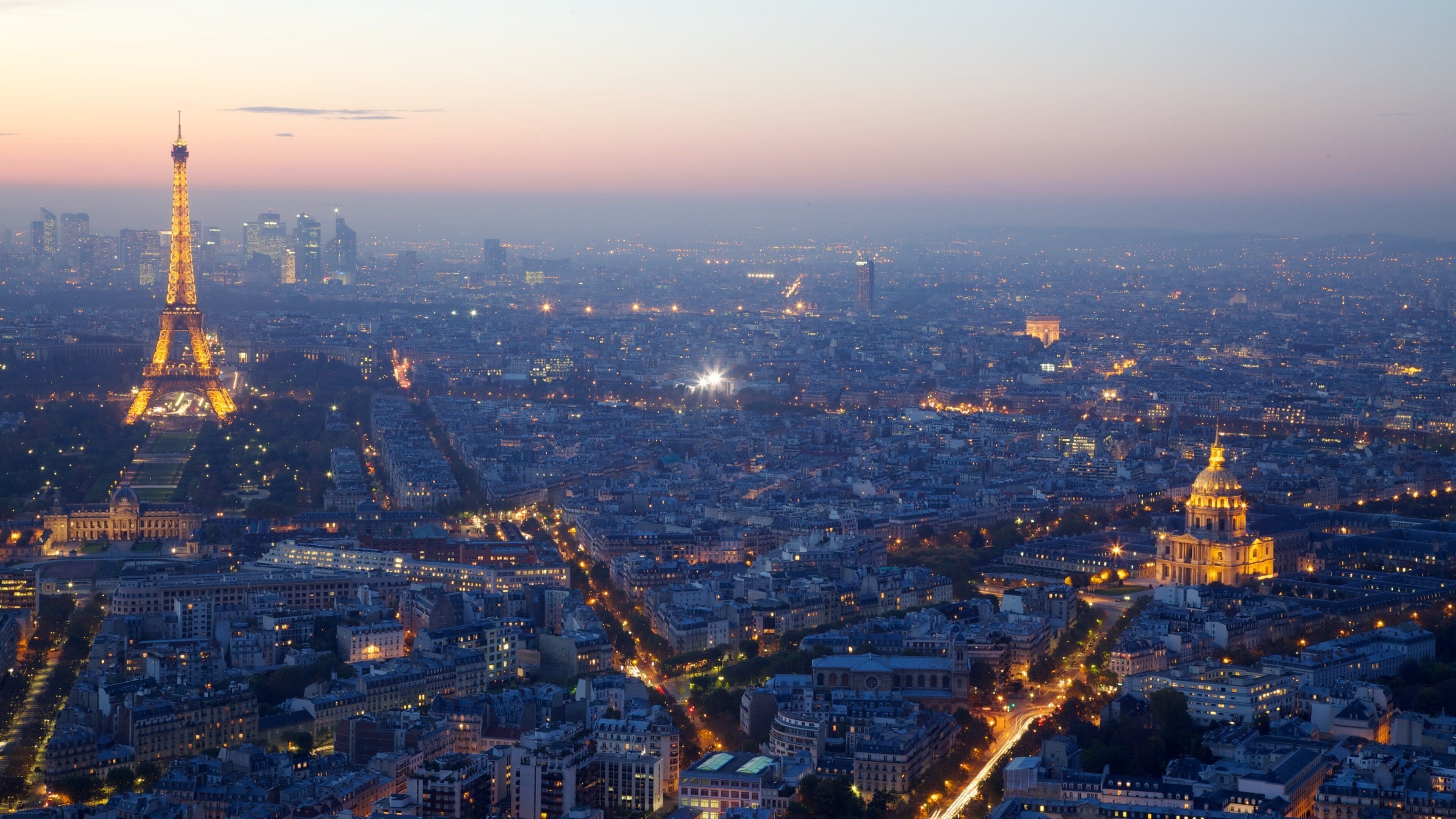 Ile-de-France showing a sunset and a city