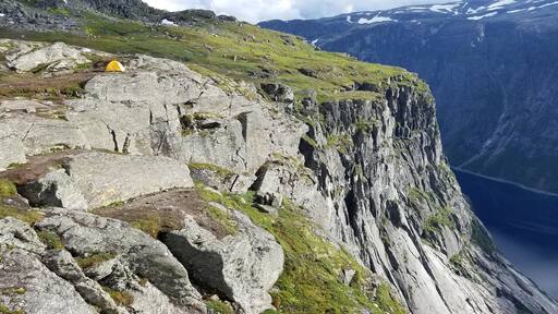 This was from my first backpacking experience ever. I was thoroughly unprepared with my 40+ year old 15 pound tent from my boyfriend's grandfather but it all worked out. This was someone else's nicer and lighter tent and man did they nab a great view. Despite the rain and wind, it was definitely worth it. I love this picture because it shows just how small humans can be compared to the awesome vastness of nature. #Adventure means going out of your comfort zone and I certainly did with no regrets.