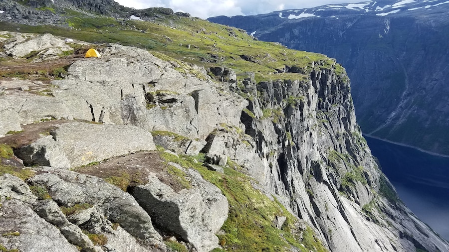 This was from my first backpacking experience ever. I was thoroughly unprepared with my 40+ year old 15 pound tent from my boyfriend's grandfather but it all worked out. This was someone else's nicer and lighter tent and man did they nab a great view. Despite the rain and wind, it was definitely worth it. I love this picture because it shows just how small humans can be compared to the awesome vastness of nature. #Adventure means going out of your comfort zone and I certainly did with no regrets.