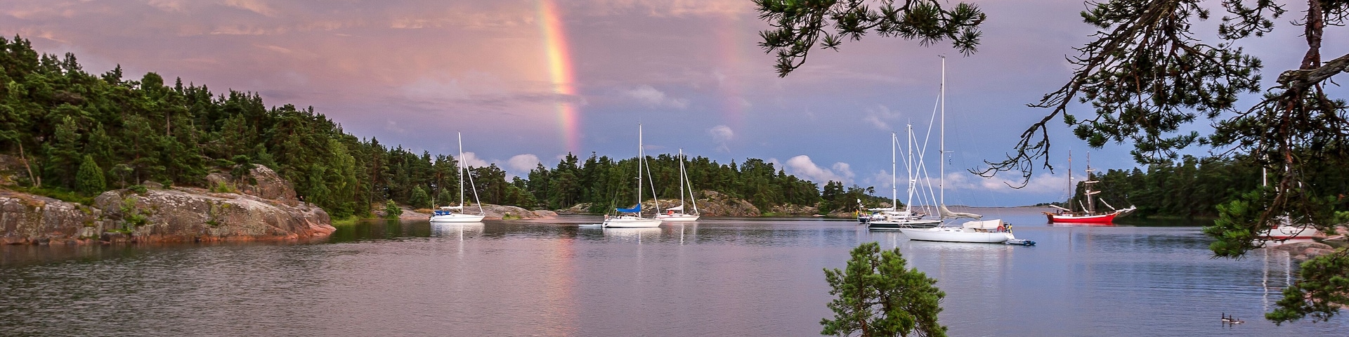 sailing yachts anchoring in äpskär, Stora kalvö in the valdemarsvik skärgard, swedish east coast, Scandinavia
