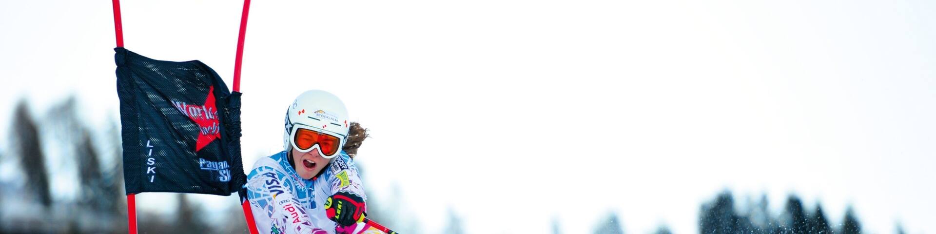 Soell showing snow skiing and snow as well as an individual femail