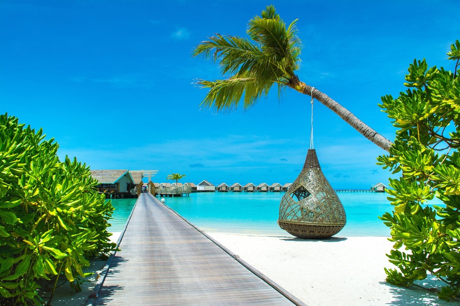 Dhidhoofinolhu, Maldives - 5 July 2017: Chill lounge zone and restaurant   in the crystal water of the Indian Ocean, Maldives, 5 July 2017