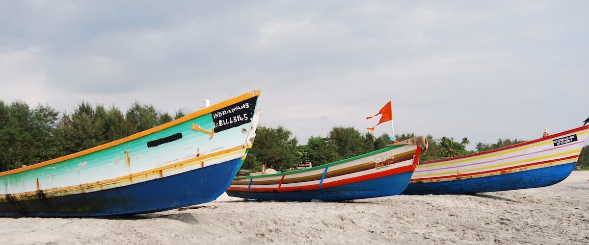 Fishermen pull their boats up onto the beach when they are not in use. I love the colorful paint that makes each boat unique!