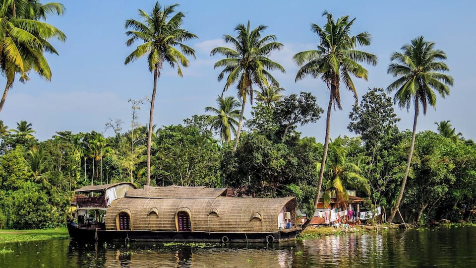 House boat in Alleppey, Kerala, India. This region is beautiful and if you have never stayed on a house boat, this is a good choice.