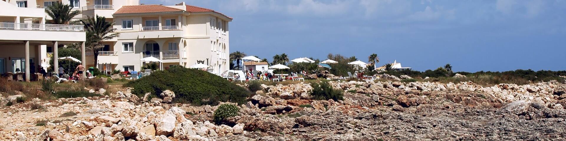 Menorca hotel view with rock beach Son Bou; Shutterstock ID 3618516