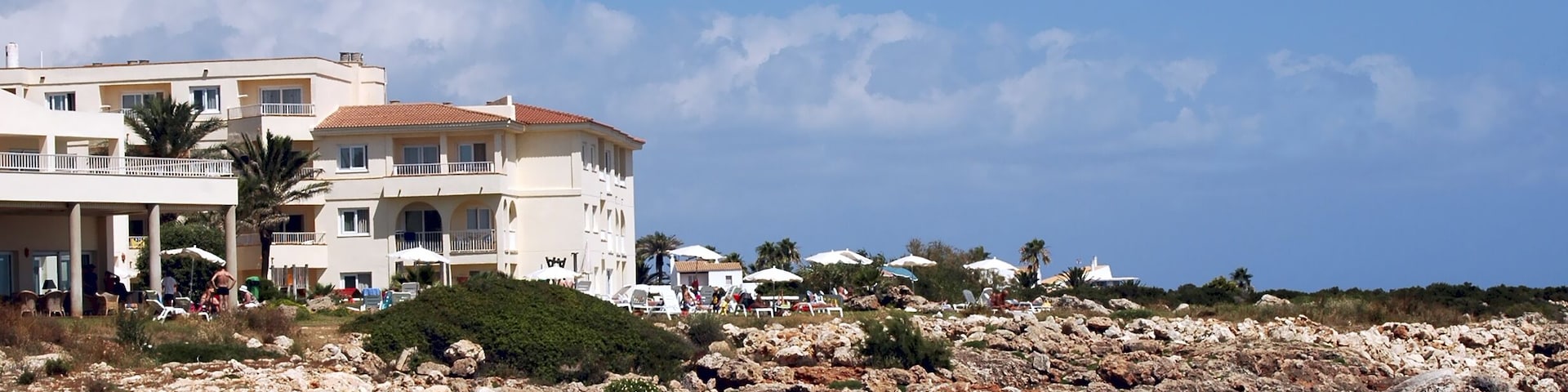 Menorca hotel view with rock beach Son Bou; Shutterstock ID 3618516