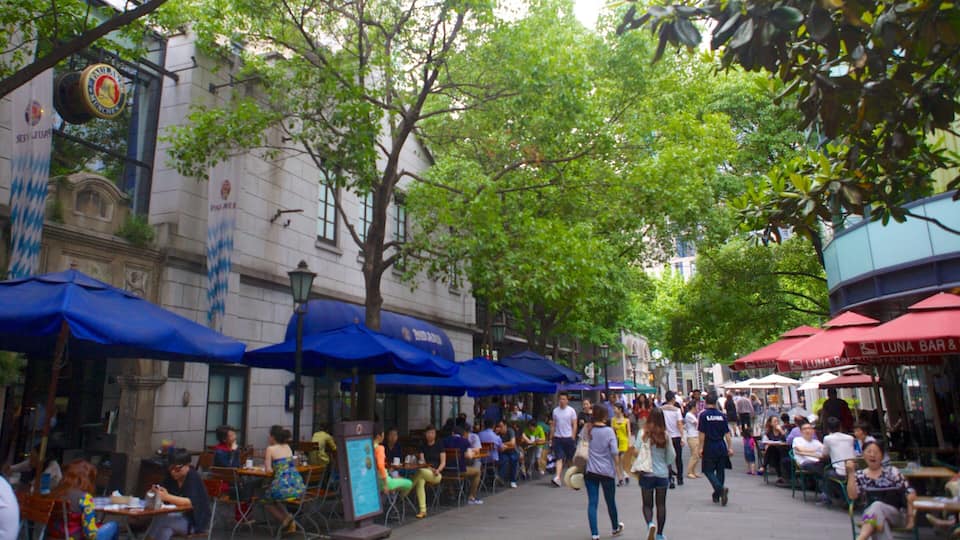 Xintiandi which includes a city, a bar and street scenes