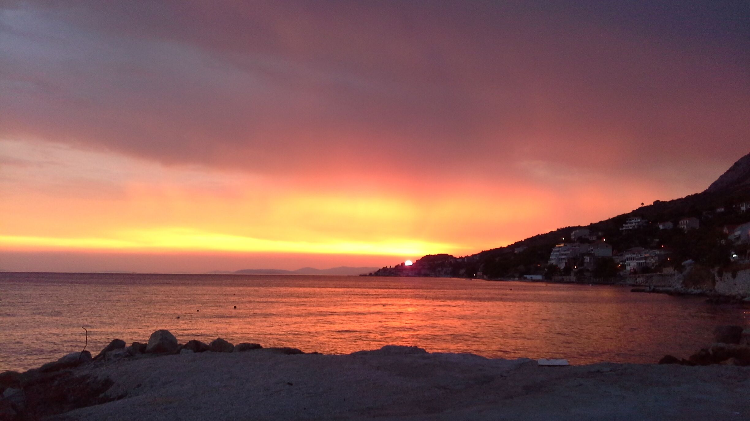 A rare stunning red sunset at Suhi Potok a result of storms brewing over Split.