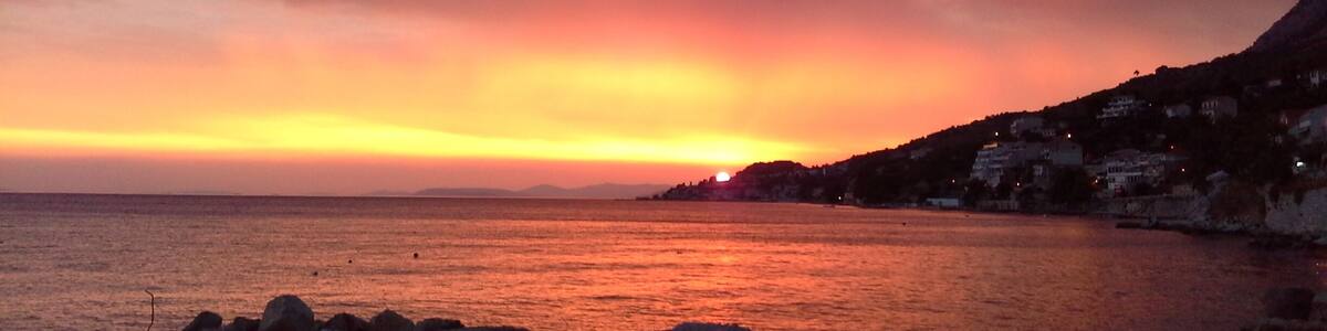 A rare stunning red sunset at Suhi Potok a result of storms brewing over Split.