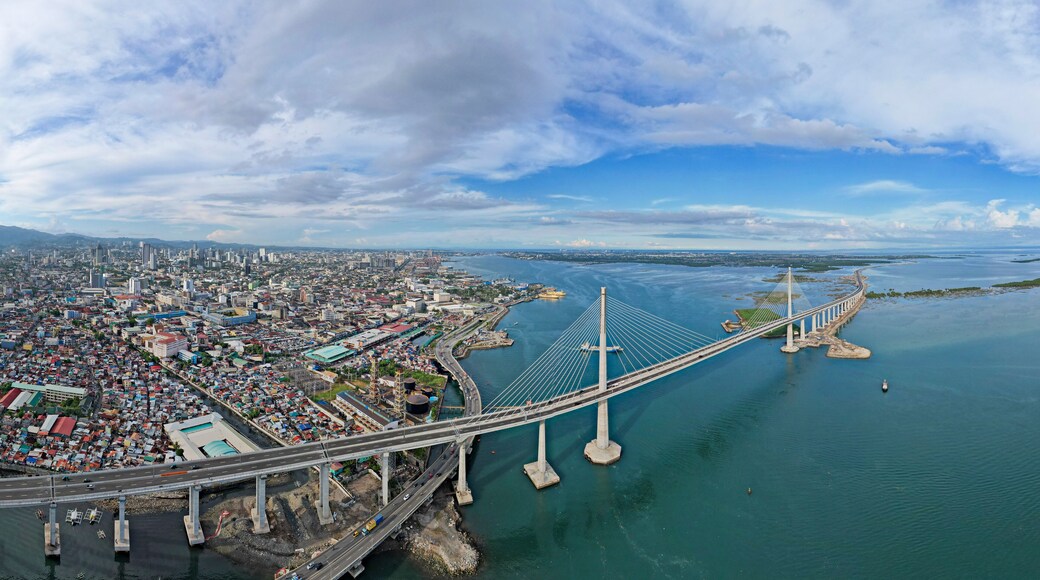 Cebu City, Philippines - Panoramic aerial of the Metro Cebu Skyline and Cebu - Cordova Bridge.