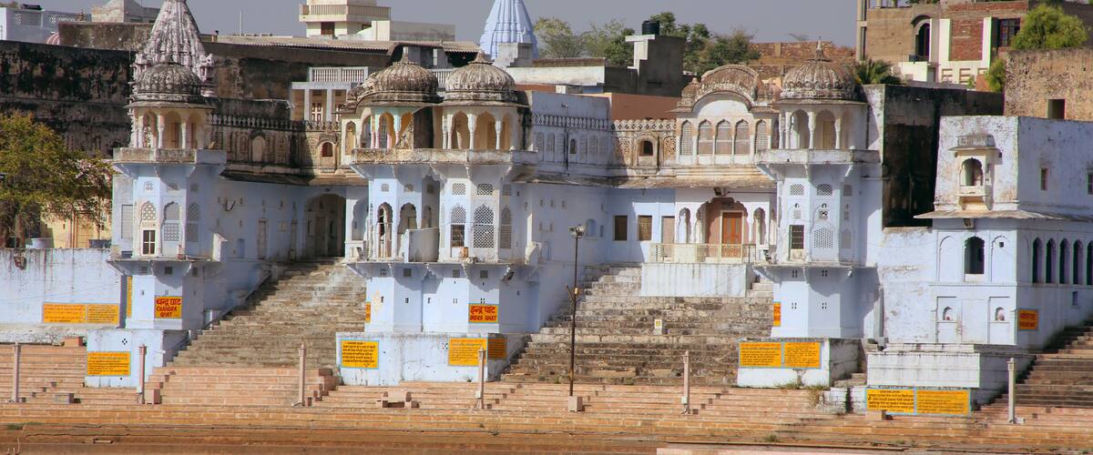 A historic temple complex with multiple domes and intricate architecture.