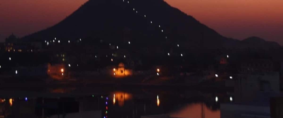 At one end of the holy lake in Pushkar is the perfect place to see the sunset. There is a Sunset ceremony with drumming it was excellent.At the opposite end you can see the lighted pathway Leading up the mountain to Savitri Temple with great sunrise views. 
#Mountains