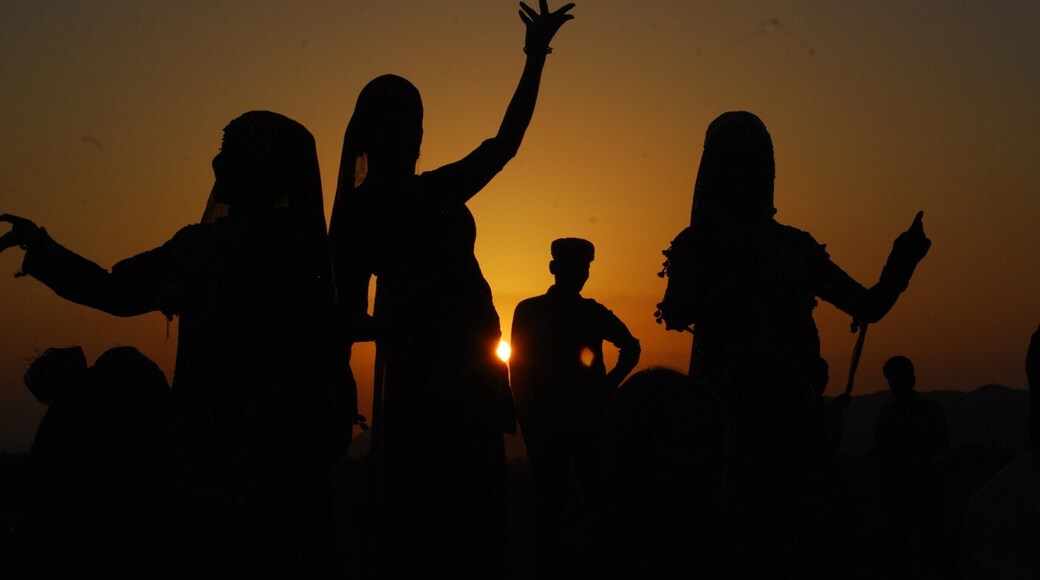 A tourist (tall lady, second from left) dances with native girls during a cultural fest organised on World Tourism Day 2014.
Pushkar is flocked by tourists throughout the year. it has got the exquisite mix of holy and hippie culture.