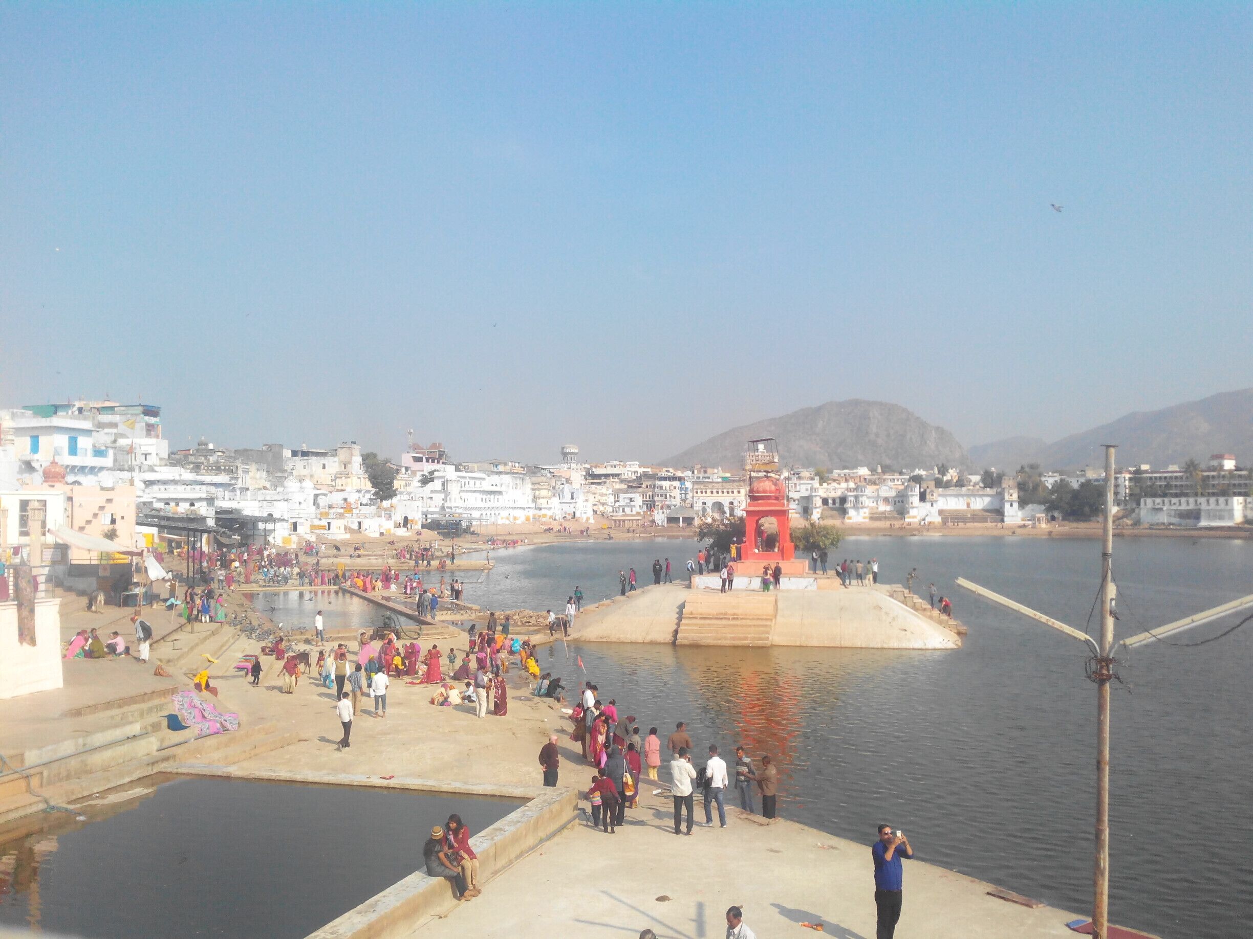 Pushkar Lake is surrounded by 52 bathing ghats (a series of steps leading to the lake), where pilgrims throng in large numbers to take a sacred bath, especially around 'Kartik Poornima' (October–November) when the Pushkar Fair is held. A dip in the sacred lake is believed to cleanse sins and cure skin diseases. Over 500 Hindu temples are situated around the lake precincts.